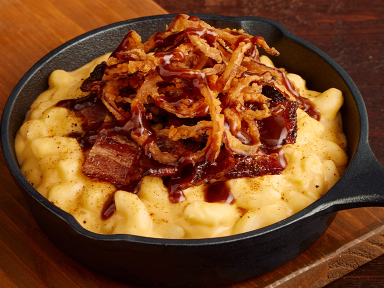 Seasonal menu candied bacon mac and cheese at Sonny's BBQ