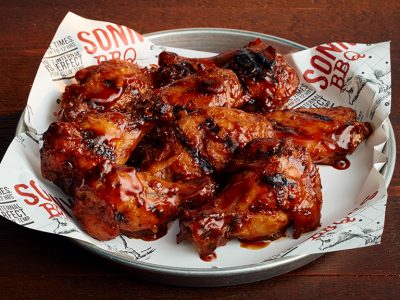 Seasonal menu Florida Citrus Sauce wings at Sonny's BBQ